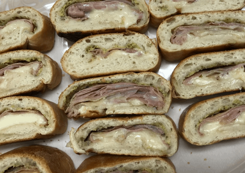 Savory Dishes - Stromboli cut up filled with ham and provolone cheese