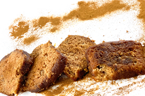 Close-up of sliced apple cinnamon bread, cinnamon swirl, on a white background